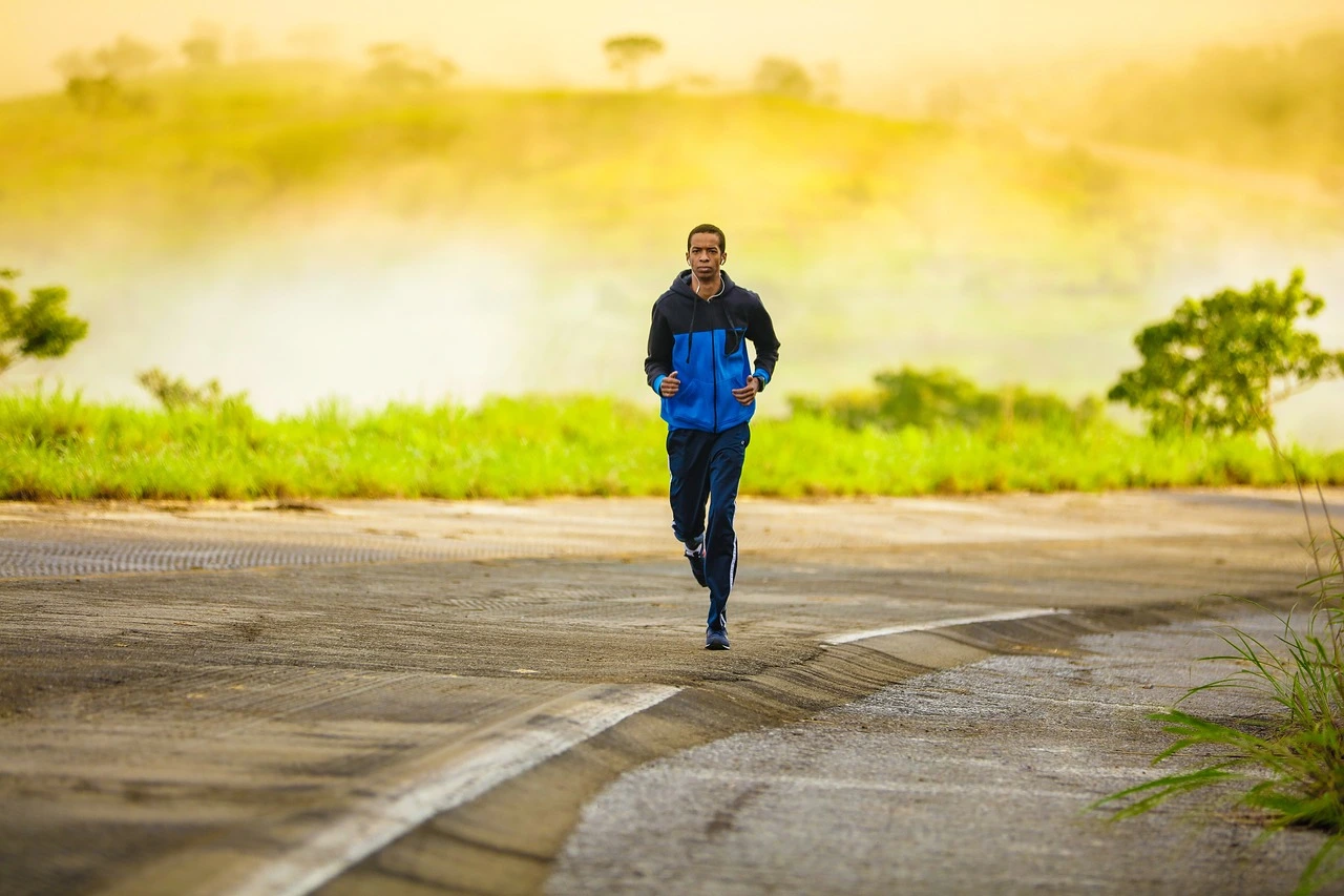 Cardiologist in 3071 Perry Ave, Bronx, NY 10467 — a man jogging outdoors, symbolizing cardiovascular wellness and active lifestyle supported by expert heart care.