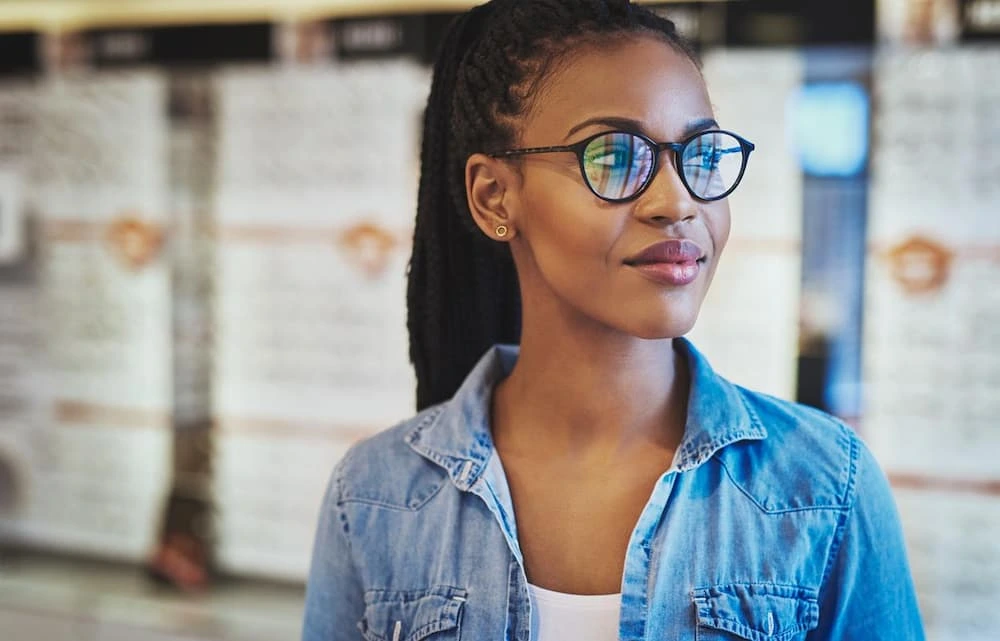 Optometrist in 3071 Perry Ave, Bronx, NY 10467 — a young woman wearing stylish eyeglasses, representing clear vision and personalized eye care services.